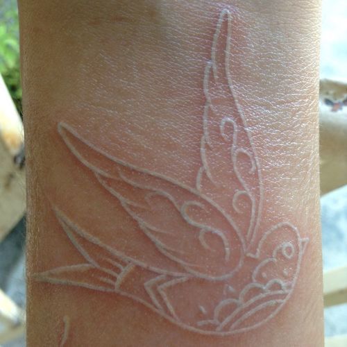 tatuaż ptak